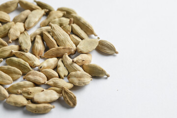 dried cardamom seeds isolated on white
