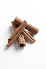 cinnamon sticks isolated on white