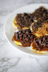 close up shoot of pancakes with chocolate topping