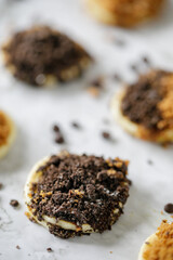 closeup shoot of pancake with chocolate biscuits crunches topping