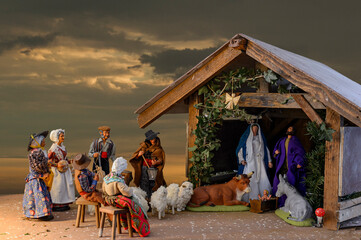 Christmas Crib in Alsace, France - An ancient tradition for which each family installs a table with a crib near the fireplace. The characters: shepherds, fishmongers, bakers are made with great care.