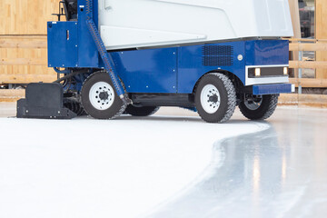 special machine for cleaning ice on an ice rink at work. Transport industry