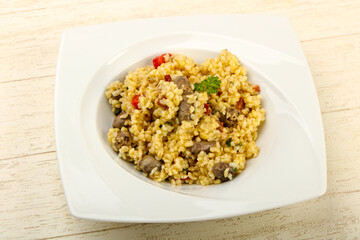 Bulgur with chicken hearts