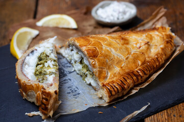 Sea bass wellington, fish baked in puff pastry