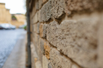 Photo A grey stone wall on the right