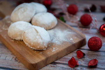 Greek  Christmas cookies kourabiedes with almonds powered with white sugar
