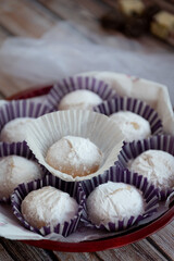 Greek  Christmas cookies kourabiedes with almonds powered with white sugar