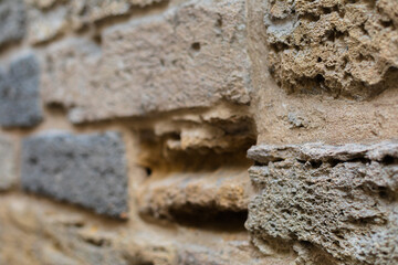 Photo A grey stone wall on the right