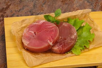 Raw tuna round steak for grill