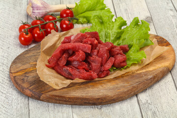 Raw beef meat sliced for cooking