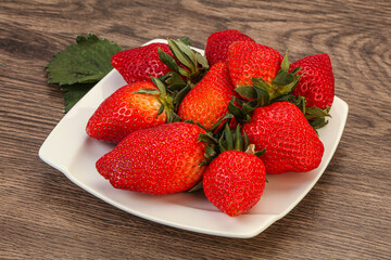 Ripe sweet strawberry with leaf