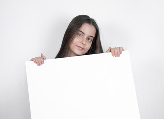 Fototapeta premium woman holding a blank billboard