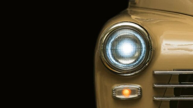 retro car with headlights close-up, panorama