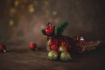 new year and christmas background with different glasses and toys for the christmas tree on a dark background