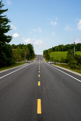New paved highway through the summer countryside