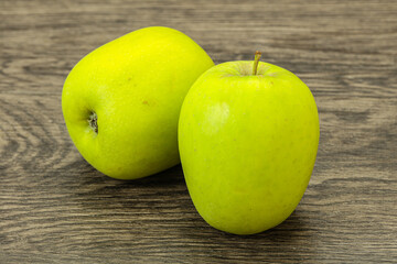 Two ripe green sweet apples