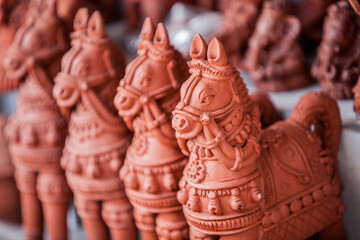 terracotta clay-based unglazed ceramic horses