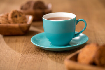 wooden tray with many different types of cookies on wooden background.