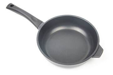 Black frying pan with non-stick teflon coating on white background
