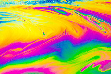 Psychedelic multicolored patterns background. Photo macro shot of soap bubbles