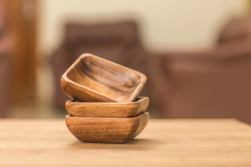 Dishes from the olive tree on wooden table.