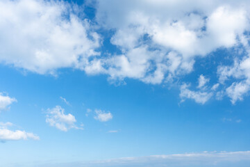 Blue sky. Stratocumulus clouds on blue sky background.