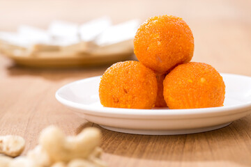 Pile of orange Indian sweets Motichoor Laddu or Laddoo