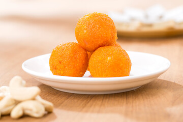 Pile of orange Indian sweets Motichoor Laddu or Laddoo