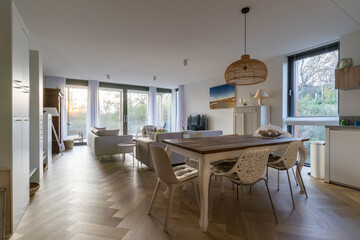 Decorated modern living room interior with terrace view