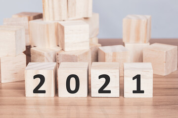 Wooden blocks with numbers 2021 The beginning of the new year on the table. Happy New Year and...