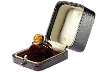 antique golden amber ring in vintage ring box isolated on white background