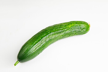 Fresh green cucumber isolated on white background