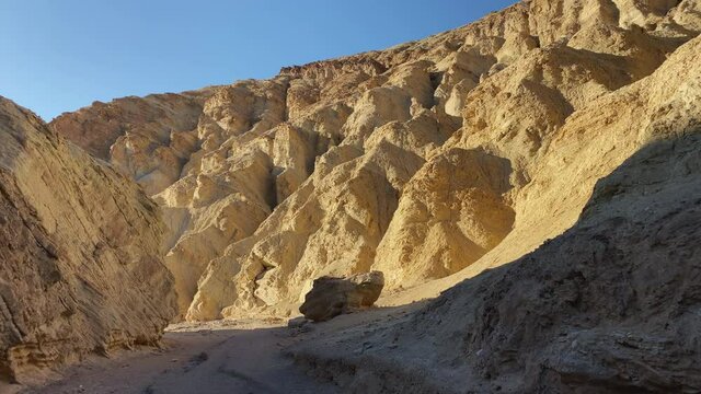 Very nice canyon at the Golden Canyon at sunset at Death Valley National Park, CA, USA. Slow pan to the left.