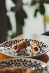 Ilalian Dessert Cannoli, Sicilian cuisine. Sweet shells of fried pastry dough, filled with sweet, creamy ricotta filling usually containing ricotta