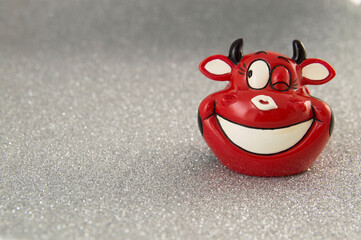 Cheerful bull smiling on gray background.Symbol of 2021. New year 2021 concept. Place for your text.
