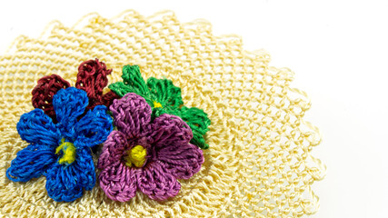 Traditional handcrafted needlework on white background