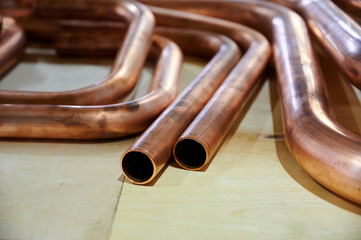 copper pipes on a table