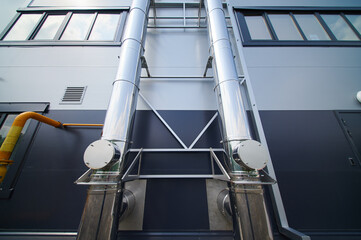 ladder and pipes on the wall