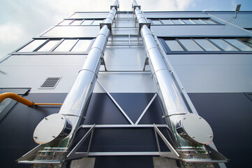 pipes on a wall of a factory