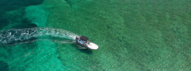 Aerial drone ultra wide photo of tropical exotic island seascape with emerald clear sea