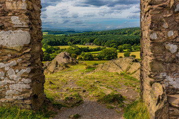 A view from the top of the hill with Old John folly past the Charnian rocks in Bradgate Park, Leicestershire, towards Charnwood forest