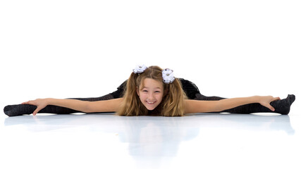 Fototapeta premium Girl sitting on floor with her legs wide apart