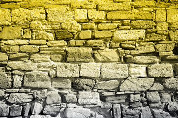 Pattern with brick wall in two trendy colors of 2021 year illuminating ultimate gray for wallpaper design. Yellow background. Horizontal wallpaper, background. Exterior brick wall texture background.