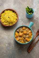 Top view pumpkin curry with chicken with rice biriani
