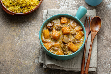 Indian pumpkin curry with chicken with rice biriani