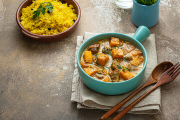 Delicious curry with chicken and rice pilaf, copy space
