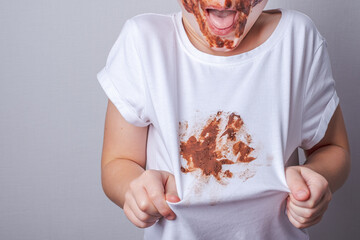 dirty stain on white clothe. isolated. on a gray background
