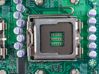 contacts for connecting the CPU on the motherboard to the processor socket, close-up macro,...