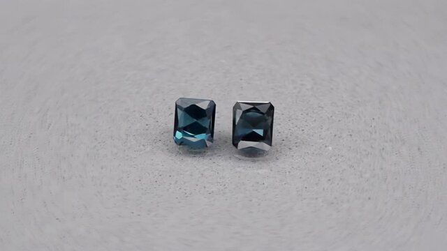 natural pair blue tourmaline indicolite on the background