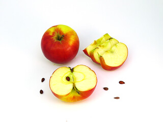 Whole nice apple with slices apple and  seeds.
